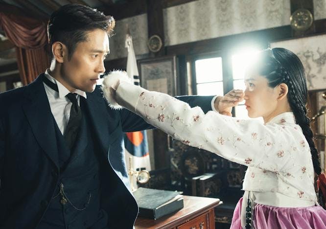 lee byung-hun kim tae-ri mr. sunshine person human clothing apparel suit coat overcoat