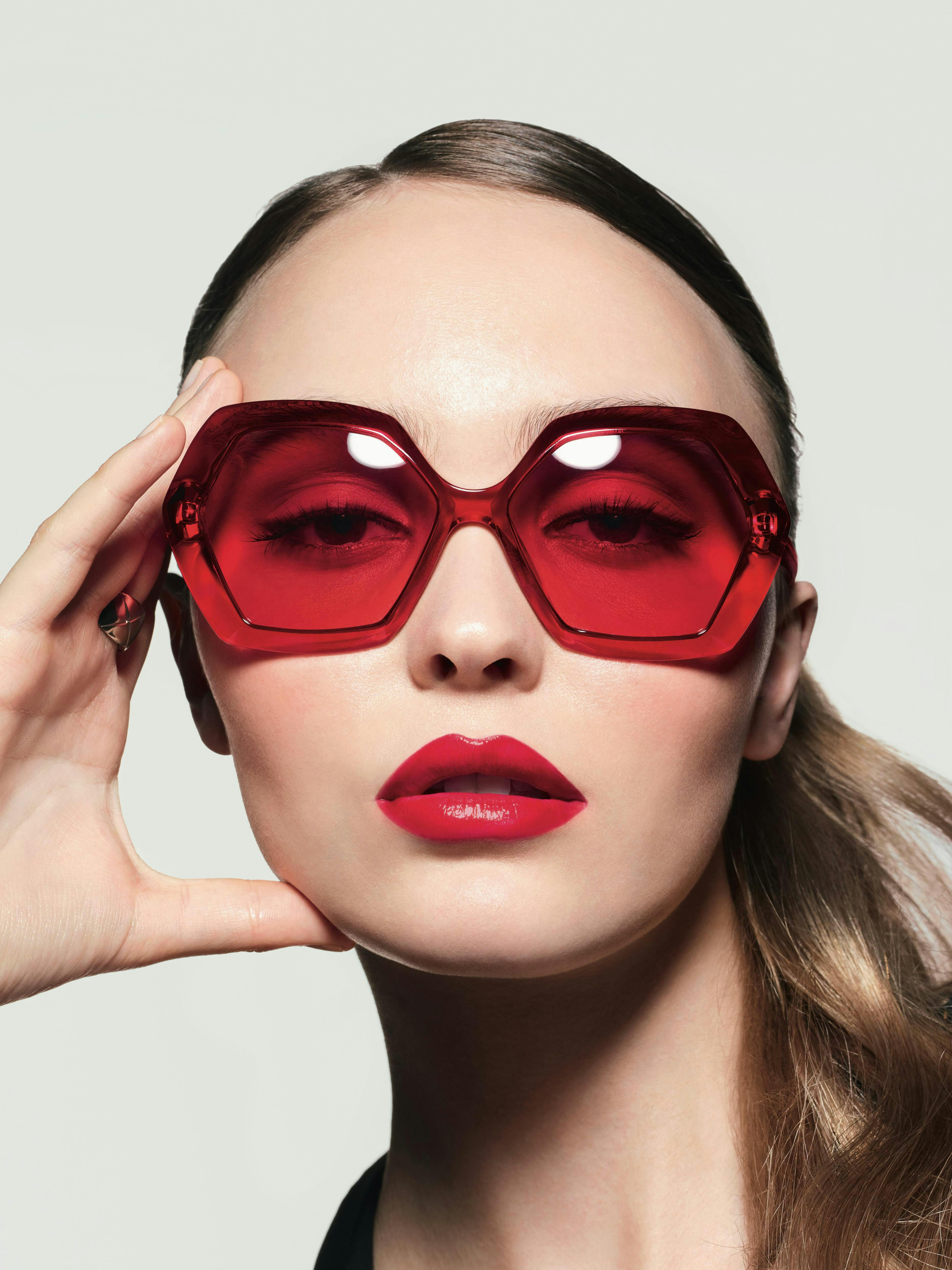 glasses accessories accessory sunglasses person human lipstick cosmetics