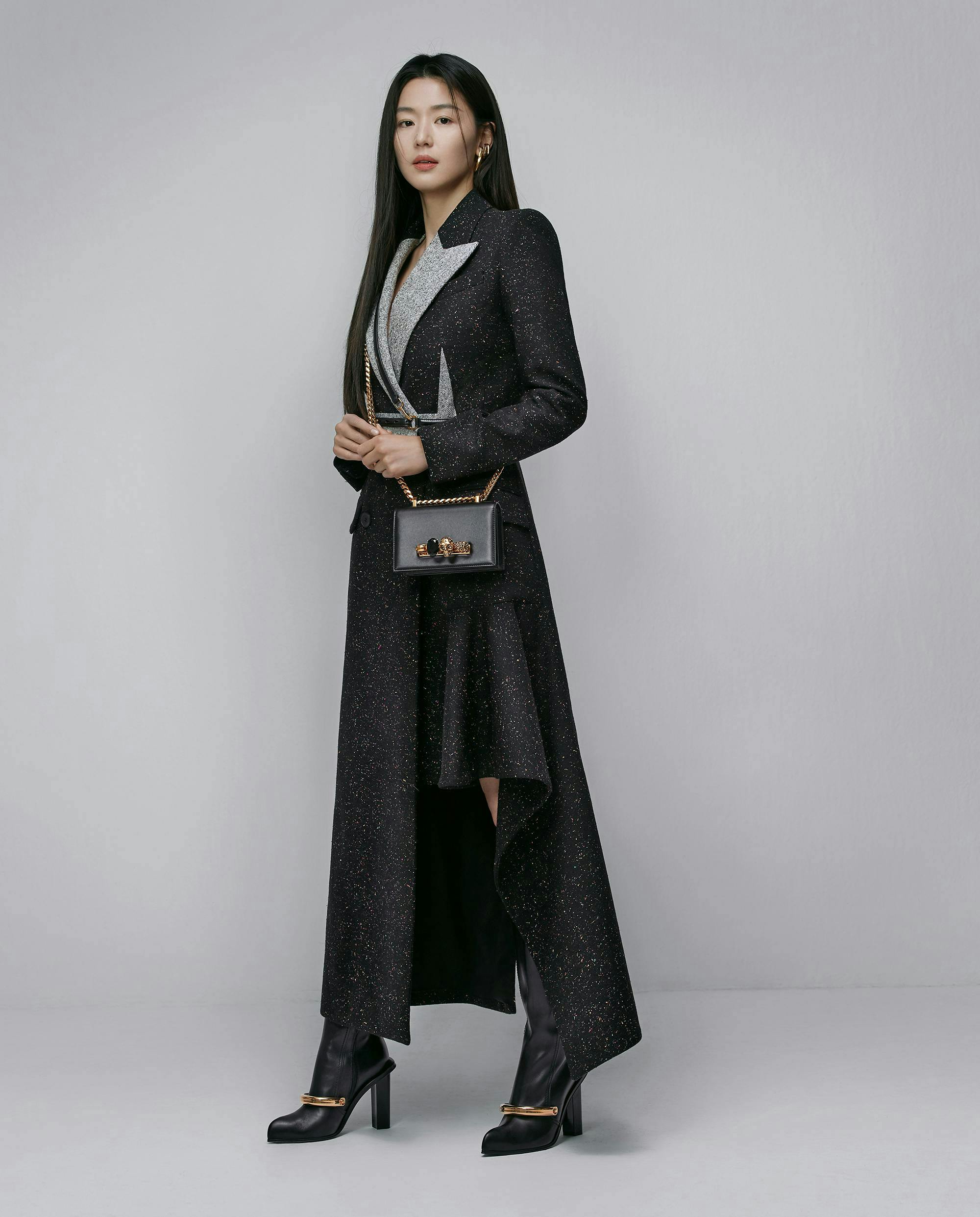 clothing apparel sleeve overcoat coat dress long sleeve person human female