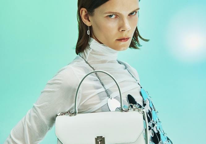 sleeve clothing handbag bag accessories accessory person human purse long sleeve