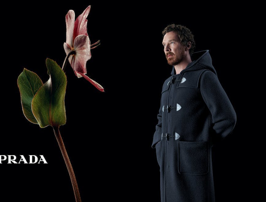 clothing coat flower plant flower arrangement photography head person portrait overcoat